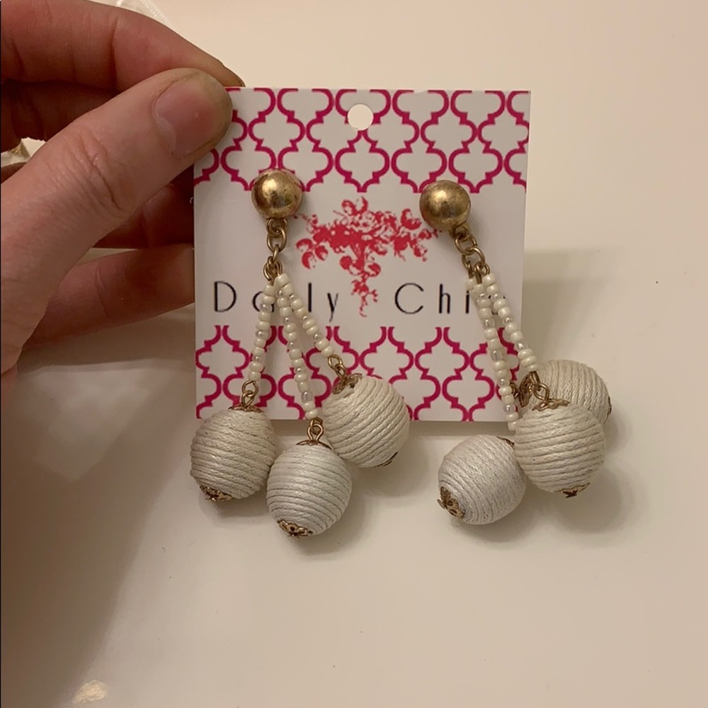 Stood back white pom-pom ball earrings